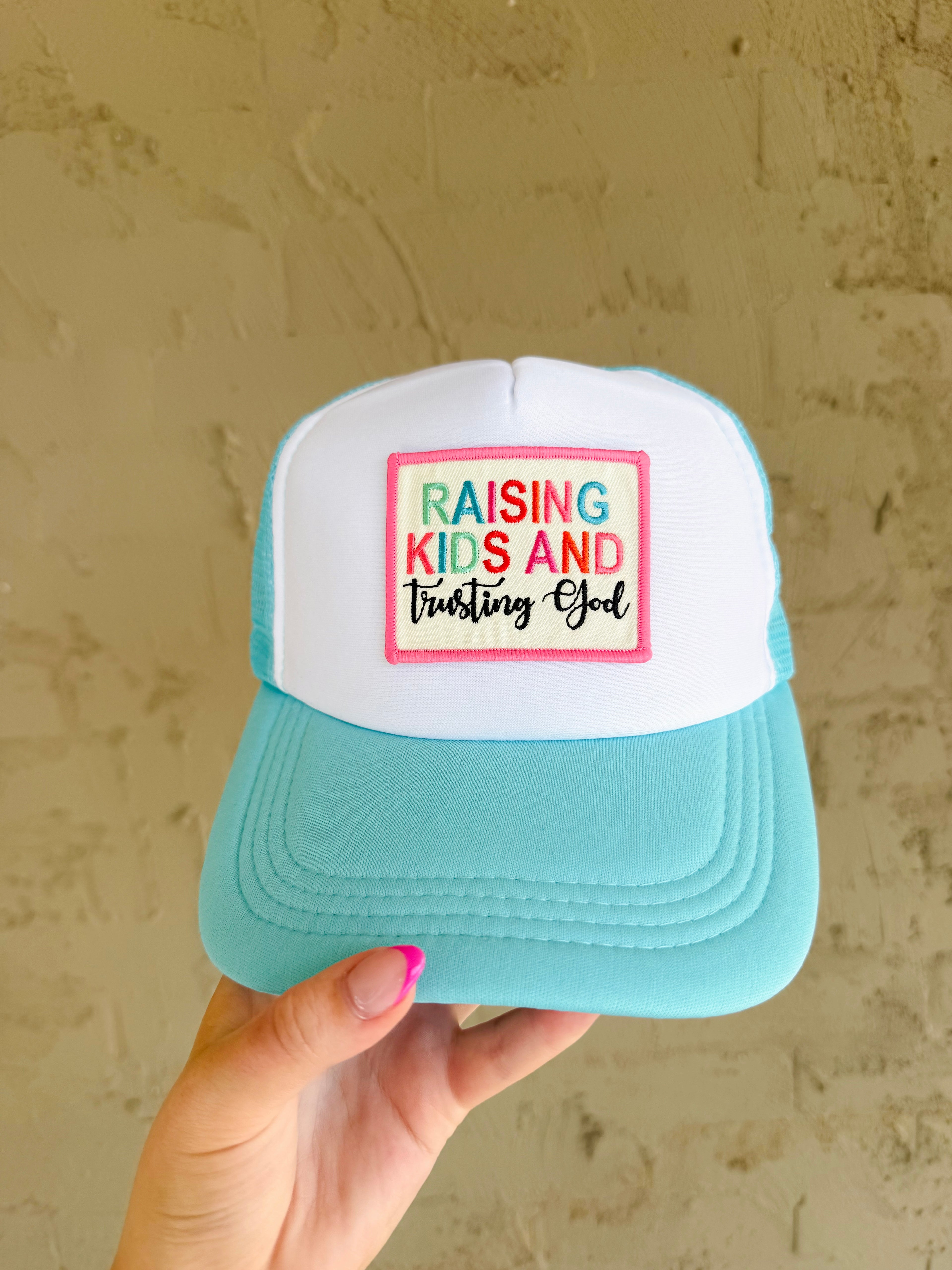 Raising Kids and Trusting God Trucker Hat- Light Blue
